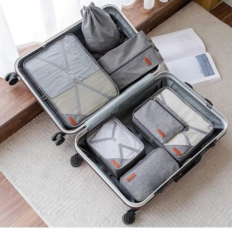 卸売品質旅行荷物パッキング キューブ 7 のセット カスタマイズされたユニセックス防水スーツケース圧縮旅行バッグ
